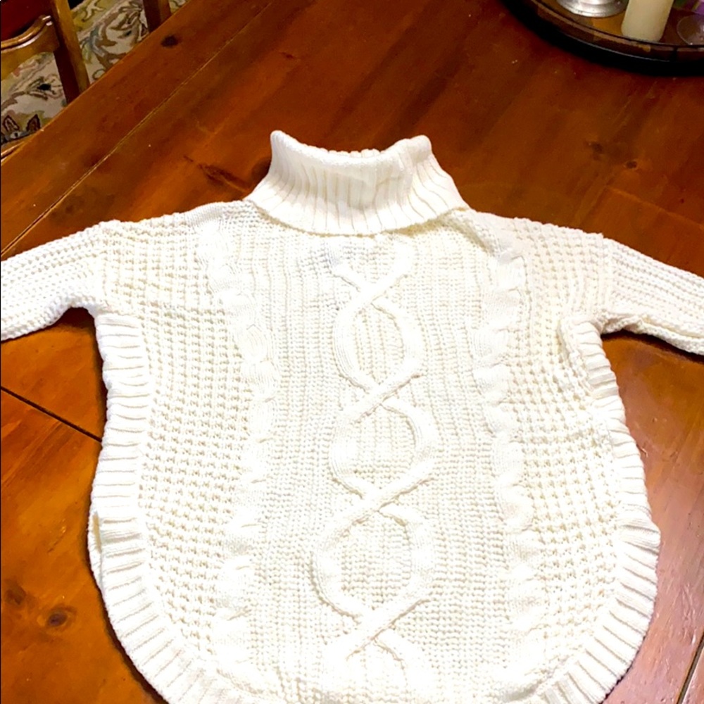 Creamy white turtle neck sweater